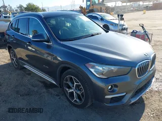 2016 BMW X1 xDrive28i z VIN WBXHT3C30G5E55323, wystawiony jako IAAI lot #42712328 z przebiegiem 161 577 mil mil oraz . Historia ofert i sprzedaży dostępna na DreamBid. Obrazek 1.