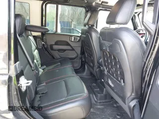 2020 Jeep Wrangler Unlimited Rubicon с VIN 1C4HJXFN7LW176069, выставлен на аукционе IAAI как лот 41575766 с пробегом 57 830 миль миль и . История ставок и продаж доступна на DreamBid. Изображение 8.