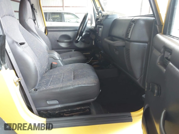 2001 Jeep Wrangler Sport with VIN 1J4FA49S81P370778, listed as a IAAI auction lot 42715015 with 123,259 mi miles and . Bid and sale history available at DreamBid. Image 5.