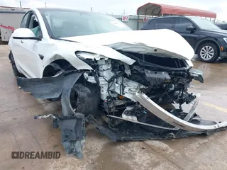 2023 Tesla Model 3 Performance z VIN 5YJ3E1EC8PF487550, wystawiony jako IAAI lot #42093712 z przebiegiem 27 305 mil mil oraz . Historia ofert i sprzedaży dostępna na DreamBid. Obrazek 6.
