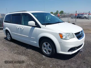 2012 Dodge Grand Caravan SXT with VIN 2C4RDGCG9CR200432, listed as a IAAI auction lot 42027477 with 99,076 mi miles and . Bid and sale history available at DreamBid. Image 1.
