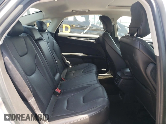 2014 Ford Fusion Titanium с VIN 3FA6P0K90ER363283, выставлен на аукционе Copart как лот 55156795 с пробегом 54 099 миль миль и Списание • Salvage title. История ставок и продаж доступна на DreamBid. Изображение 10.