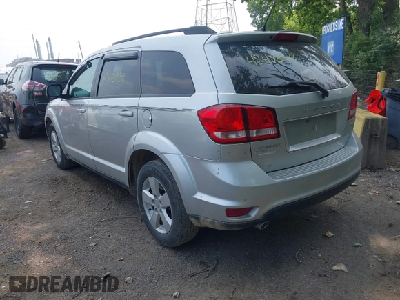 2012 Dodge Journey SXT with VIN 3C4PDDBG1CT323727, listed as a IAAI auction lot 42473238 with 77,035 mi miles and . Bid and sale history available at DreamBid. Image 3.