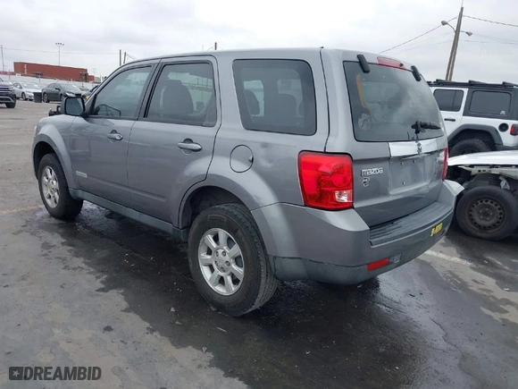 2008 Mazda Tribute Sport with VIN 4F2CZ02Z28KM31700, listed as a IAAI auction lot 41736309 with 235,848 mi miles. Bid and sale history available at carsss.com. Image 3.