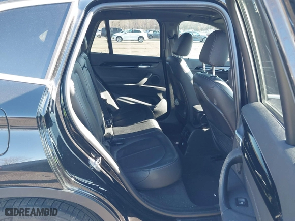 2018 BMW X1 xDrive28i with VIN WBXHT3C36J5F91110, listed as a IAAI auction lot 41757293 with 80,327 mi miles. Bid and sale history available at carsss.com. Image 8.