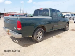 2001 Ford F-150 XL with VIN 1FTZX17221NB70154, listed as a IAAI auction lot 42410776 with 173,864 mi miles and . Bid and sale history available at DreamBid. Image 4.