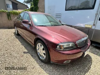 2003 Lincoln LS Sport z VIN 1LNHM87A73Y654774, wystawiony jako Copart lot #61054155 z przebiegiem 60 256 mil mil oraz Czysty tytuł • Clean title. Historia ofert i sprzedaży dostępna na DreamBid. Obrazek 1.