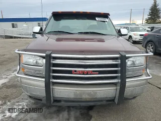2000 GMC New Sierra 1500 SL with VIN 2GTEC19V1Y1185757, listed as a Copart auction lot 42606995 with 113,635 mi miles and Salvage Title. Bid and sale history available at carsss.com. Image 5.
