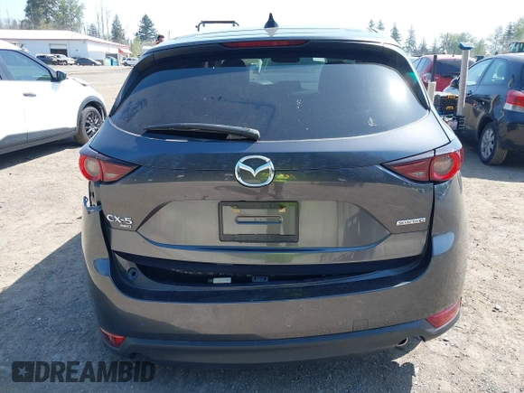 2020 Mazda CX-5 Touring with VIN JM3KFBCM6L1828691, listed as a IAAI auction lot 42100409 with 25,182 mi miles. Bid and sale history available at carsss.com. Image 16.