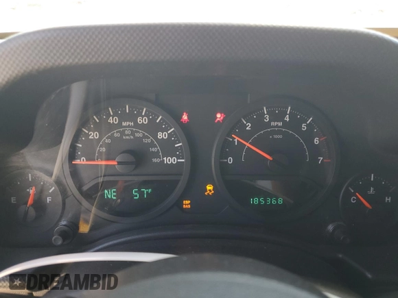 2008 Jeep Wrangler X with VIN 1J4FA24188L567678, listed as a Copart auction lot 60918635 with 185,368 mi miles and Salvage title. Bid and sale history available at DreamBid. Image 9.
