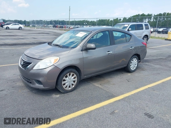 2012 Nissan Versa SV with VIN 3N1CN7AP6CL885513, listed as a IAAI auction lot 42681213 with 282,203 mi miles and . Bid and sale history available at DreamBid. Image 2.