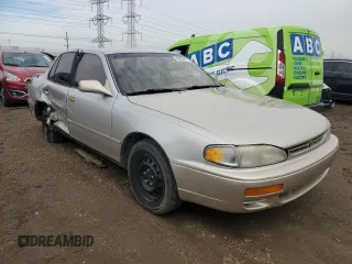 1995 Toyota Camry LE z VIN 4T1SK12EXSU529058, wystawiony jako Copart lot #49055255 z przebiegiem 166 029 mil mil oraz Szkoda całkowita • Salvage title. Historia ofert i sprzedaży dostępna na DreamBid. Obrazek 4.