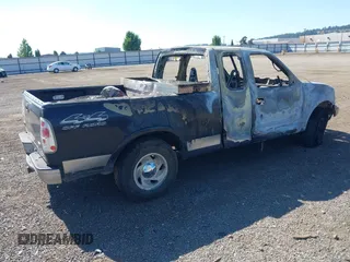 1999 Ford F-150 XL z VIN 1FTRX18L5XNB80564, wystawiony jako IAAI lot #42670775 z przebiegiem Nie podano mil oraz . Historia ofert i sprzedaży dostępna na DreamBid. Obrazek 4.