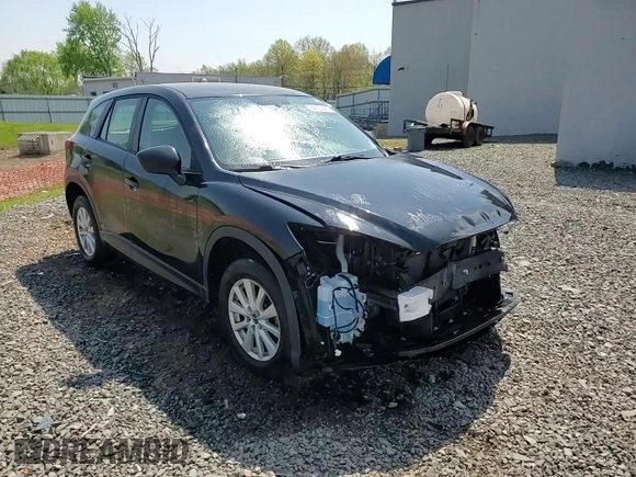 2014 Mazda CX-5 Sport with VIN JM3KE2BE8E0392545, listed as a Copart auction lot 54131455 with 63,917 mi miles and Salvage Title. Bid and sale history available at carsss.com. Image 15.