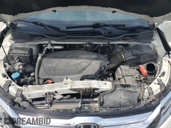 2019 Honda Odyssey Touring z VIN 5FNRL6H80KB501681, wystawiony jako Copart lot #58814945 z przebiegiem 105 287 mil mil oraz Szkoda całkowita • Salvage title. Historia ofert i sprzedaży dostępna na DreamBid. Obrazek 12.