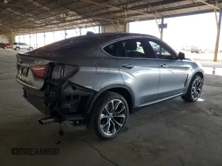 2015 BMW X6 xDrive35i with VIN 5UXKU2C59F0N77312, listed as a Copart auction lot 63591123 with 121,105 mi miles. Bid and sale history available at carsss.com. Image 3.