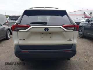 2019 Toyota RAV4 Hybrid LE with VIN JTMMWRFV9KD021285, listed as a IAAI auction lot 42757660 with 74,870 mi miles and . Bid and sale history available at DreamBid. Image 16.