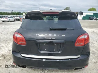 2014 Porsche Cayenne z VIN WP1AA2A21ELA92785, wystawiony jako Copart lot #56255925 z przebiegiem 116 925 mil mil oraz Szkody całkowita. Historia ofert i sprzedaży dostępna na DreamBid. Obrazek 6.