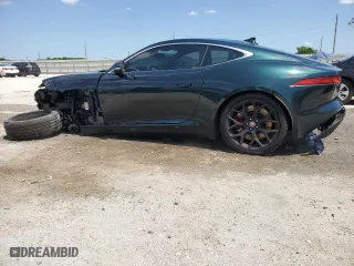 2015 Jaguar F-TYPE V6 S with VIN SAJWA6BC8F8K14232, listed as a Copart auction lot 52174245 with 64,852 mi miles and Salvage Title. Bid and sale history available at carsss.com. Image 2.