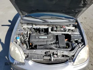2004 Honda Insight z VIN JHMZE14794T000085, wystawiony jako Copart lot #74238984 z przebiegiem 165 012 mil mil oraz Szkoda całkowita • Salvage title. Historia ofert i sprzedaży dostępna na DreamBid. Obrazek 13.