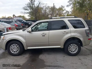 2011 Mercury Mariner Premier with VIN 4M2CN8H78BKJ01173, listed as a IAAI auction lot 40734817 with 67,784 mi miles. Bid and sale history available at carsss.com. Image 15.