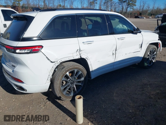 2023 Jeep Grand Cherokee Overland with VIN 1C4RJHDG3PC508742, listed as a IAAI auction lot 41250518 with 23,035 mi miles and . Bid and sale history available at DreamBid. Image 4.