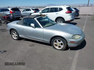 2000 Mazda MX-5 Miata with VIN JM1NB3536Y0142627, listed as a IAAI auction lot 42820470 with 116,989 mi miles and . Bid and sale history available at DreamBid. Image 1.