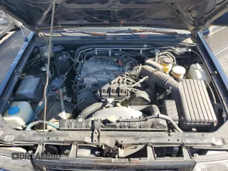 1995 Honda Passport z VIN 4S6CM58V0S4425974, wystawiony jako Copart lot #73371724 z przebiegiem 161 173 mil mil oraz Tytuł czysty. Historia ofert i sprzedaży dostępna na DreamBid. Obrazek 12.