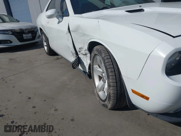 2013 Dodge Challenger SXT z VIN 2C3CDYAG8DH569468, wystawiony jako IAAI lot #41792206 z przebiegiem 161 439 mil mil oraz . Historia ofert i sprzedaży dostępna na DreamBid. Obrazek 6.