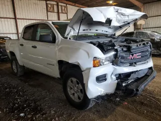 2018 GMC Canyon 2WD with VIN 1GTG5BEAXJ1328616, listed as a Copart auction lot 87008144 with 92,603 mi miles and Salvage Title. Bid and sale history available at carsss.com. Image 4.