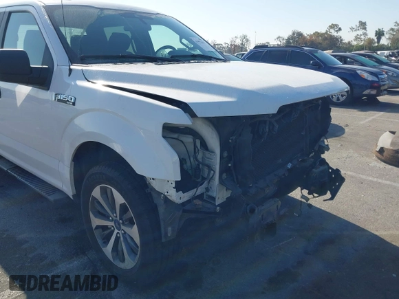 2019 Ford F-150 XL with VIN 1FTEW1C59KKE70231, listed as a IAAI auction lot 41992437 with 58,600 mi miles and . Bid and sale history available at DreamBid. Image 6.