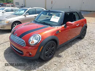 2011 MINI Convertible with VIN WMWZN3C57BTZ89303, listed as a IAAI auction lot 42352242 with 146,448 mi miles and . Bid and sale history available at DreamBid. Image 2.