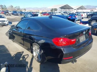 2014 BMW 4 Series 428i with VIN WBA3N7C55EK221259, listed as a IAAI auction lot 41322781 with 100,274 mi miles and . Bid and sale history available at carsss.com. Image 3.