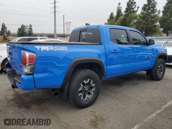 2021 Toyota Tacoma SR with VIN 3TMCZ5AN1MM426566, listed as a Copart auction lot 59613315 with 28,903 mi miles and Salvage title. Bid and sale history available at DreamBid. Image 3.