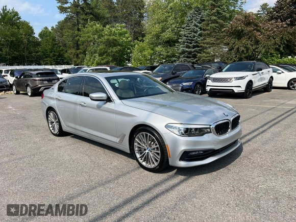 2018 BMW 5 Series 530e with VIN WBAJA9C59JG623166, listed as a Copart auction lot 60938995 with 82,070 mi miles and Clean title. Bid and sale history available at DreamBid. Image 1.
