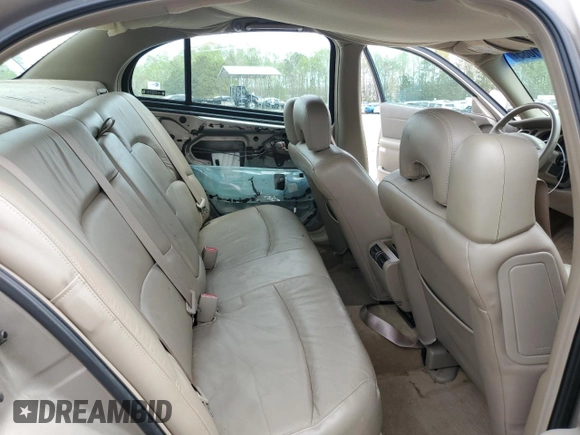 2002 Buick LeSabre Limited z VIN 1G4HR54K12U195521, wystawiony jako Copart lot #52021085 z przebiegiem 110 767 mil mil oraz Szkoda całkowita • Salvage title. Historia ofert i sprzedaży dostępna na DreamBid. Obrazek 10.