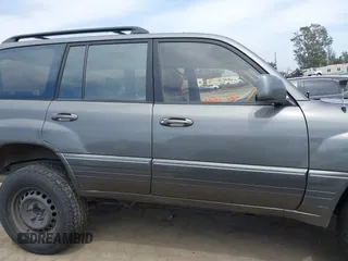 2001 Lexus LX 470 z VIN JTJHT00WX13509489, wystawiony jako IAAI lot #42227083 z przebiegiem 360 283 mil mil oraz . Historia ofert i sprzedaży dostępna na DreamBid. Obrazek 13.