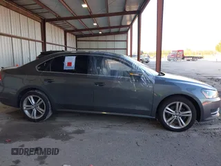 2014 Volkswagen Passat SE z VIN 1VWBN7A32EC059503, wystawiony jako IAAI lot #40876045 z przebiegiem Nie podano mil oraz . Historia ofert i sprzedaży dostępna na DreamBid. Obrazek 5.