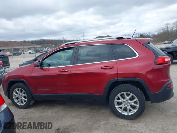 2015 Jeep Cherokee North with VIN 1C4PJMCS9FW674475, listed as a IAAI auction lot 41971771 with 186,376 mi miles. Bid and sale history available at carsss.com. Image 13.