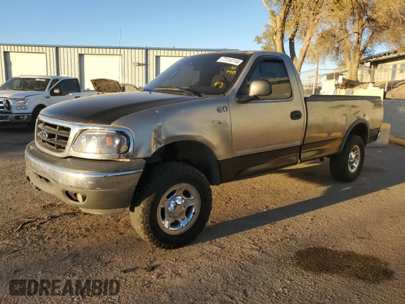 2002 Ford F-150 XL with VIN 1FTRF18262NB35586, listed as a Copart auction lot 77114114 with 166,942 mi miles and Salvage title. Bid and sale history available at DreamBid. Image 1.