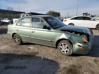 2004 Hyundai Accent GL with VIN KMHCG45C44U531828, listed as a Copart auction lot 86428134 with 92,054 mi miles and Salvage Title. Bid and sale history available at carsss.com. Image 4.