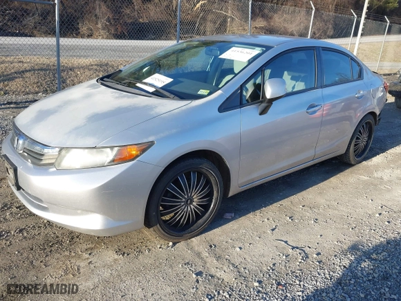 2012 Honda Civic Sdn LX with VIN 2HGFB2F57CH319433, listed as a IAAI auction lot 41536201 with 135,514 mi miles. Bid and sale history available at carsss.com. Image 17.