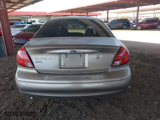 2002 Ford Taurus LX with VIN 1FAFP52U72G284116, listed as a IAAI auction lot 42004075 with 86,544 mi miles. Bid and sale history available at carsss.com. Image 16.