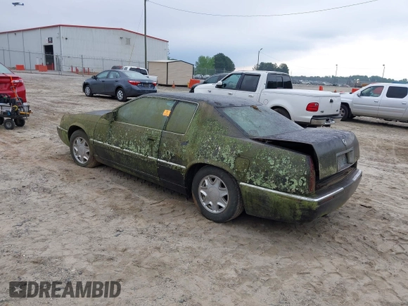 1997 Cadillac Eldorado ESC with VIN 1G6EL12Y8VU617784, listed as a IAAI auction lot 42214333 with Not Provided miles and . Bid and sale history available at DreamBid. Image 3.