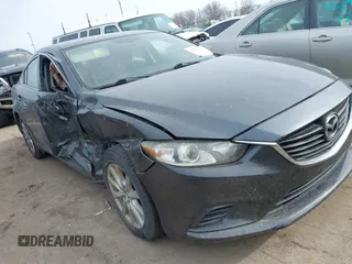 2015 Mazda Mazda6 i Sport with VIN JM1GJ1U50F1214254, listed as a IAAI auction lot 41574967 with 114,704 mi miles. Bid and sale history available at carsss.com. Image 1.