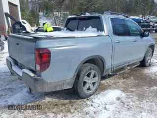 2022 Honda Ridgeline RTL-E with VIN 5FPYK3F73NB035246, listed as a IAAI auction lot 41532768 with 37,116 mi miles and . Bid and sale history available at DreamBid. Image 4.