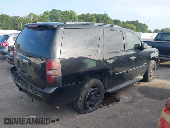 2008 Chevrolet Tahoe LS with VIN 1GNFC13C38R237657, listed as a IAAI auction lot 42620061 with 290,899 mi miles and . Bid and sale history available at DreamBid. Image 4.