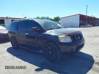 2015 Nissan Armada SV with VIN 5N1BA0ND9FN618281, listed as a IAAI auction lot 41740261 with 92,894 mi miles and . Bid and sale history available at DreamBid. Image 1.