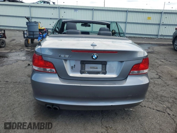 2011 BMW 1 Series 128i with VIN WBAUN1C52BVH82744, listed as a Copart auction lot 63441125 with 129,245 mi miles and Salvage title. Bid and sale history available at DreamBid. Image 6.