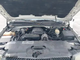 2005 Chevrolet Silverado 1500 LS with VIN 1GCEC19VX5E177408, listed as a IAAI auction lot 41758362 with 198,662 mi miles. Bid and sale history available at carsss.com. Image 10.